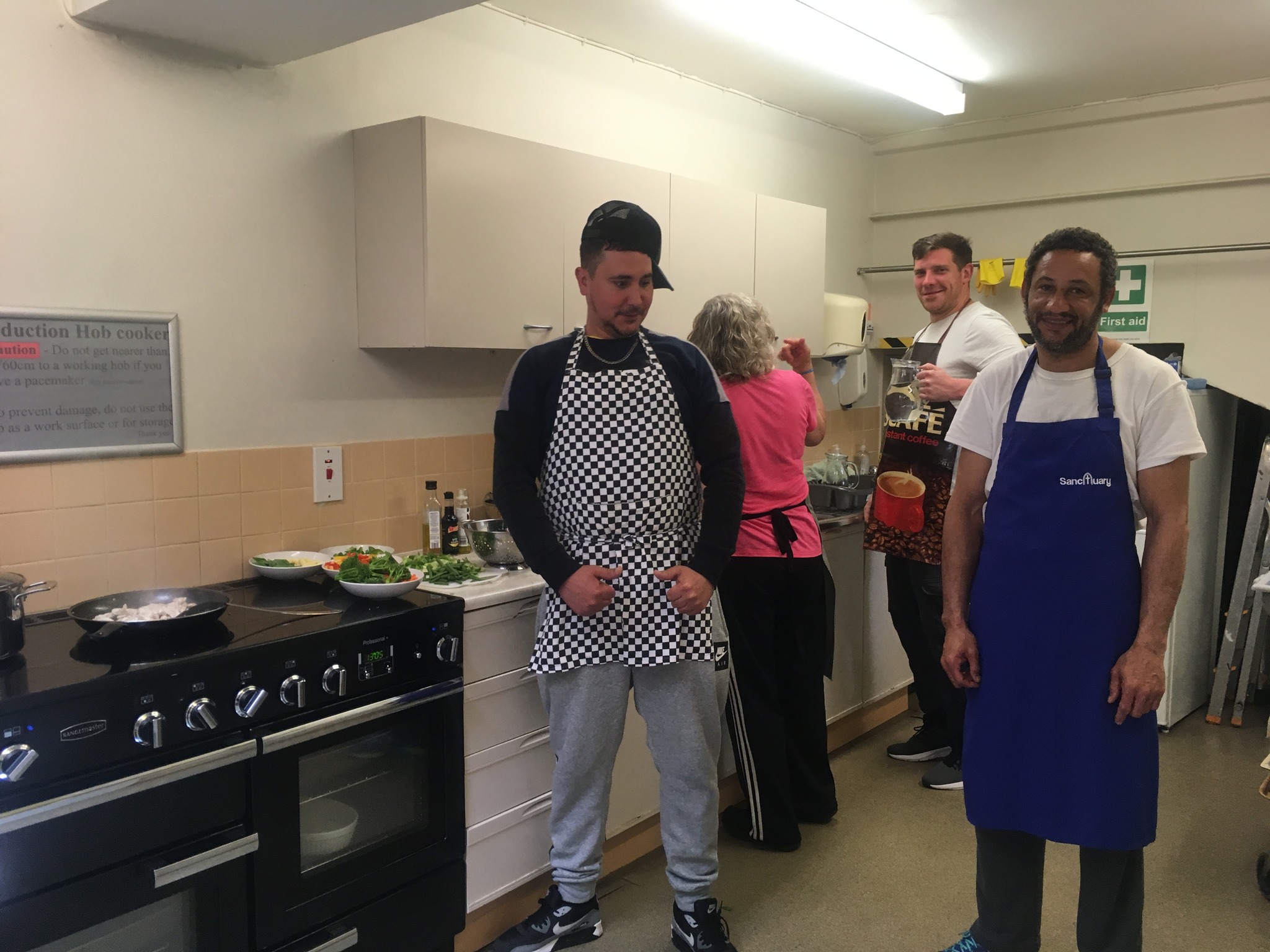 Volunteers helping guests